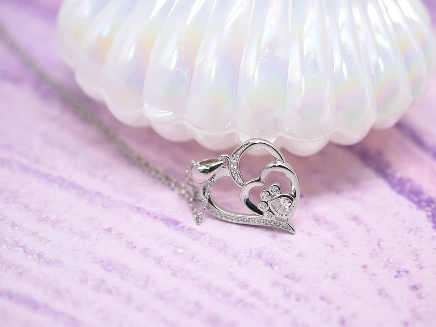Collar de plata de ley con forma de pata y corazón y circonitas cúbicas