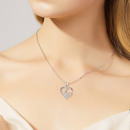 Collar de plata de ley con forma de pata y corazón y circonitas cúbicas