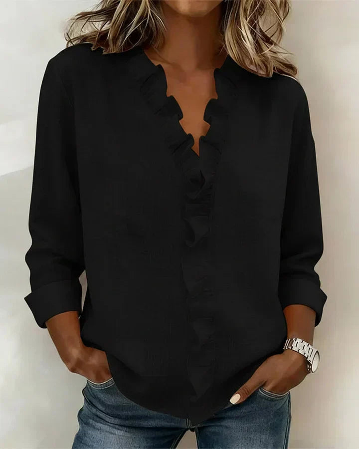 Indie · Blusa con volantes y cuello en V